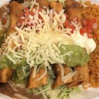 5. Chicken Rolled Taquitos · Shredded chicken with rice, beans, lettuce. Topped with salsa verde, sour cream, guacamole, ...