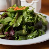 Salade Verte · Vegetarian. Mixed green salad tossed in champagne vinaigrette.