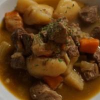 Navarin Lamb Stew · Lamb, potatoes, carrots, onions and turnips topped with fresh parsley.