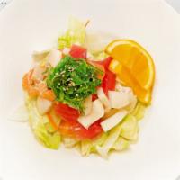 Sashimi Salad · Assorted raw fish, spring mix & tobiko w/ special sauce.