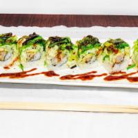 Ocean’s Eleven · Seaweed salad over salmon tempura, avocado roll w/ unagi sauce.