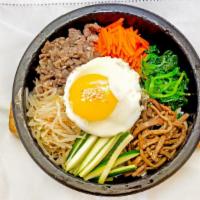 Tonkatsu Donburi · Pork cutlet, egg & vegetables over rice.