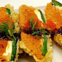 Jalapeño Poppers · fried jalapeno stuffed with cream cheese and spicy tuna.