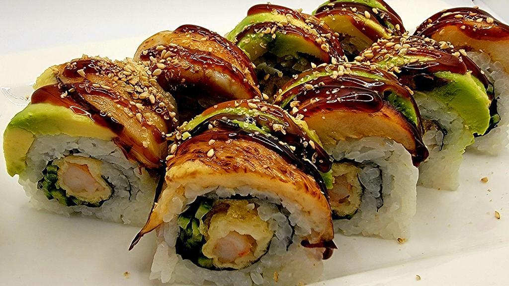 Butterfly Roll · Shrimp tempura and cucumber top with eggplant, avocado, eel sauce.