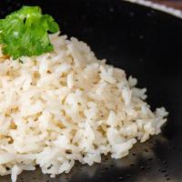 Chicken Rice (GF) · Jasmine rice steamed with Hainanese chicken stock.