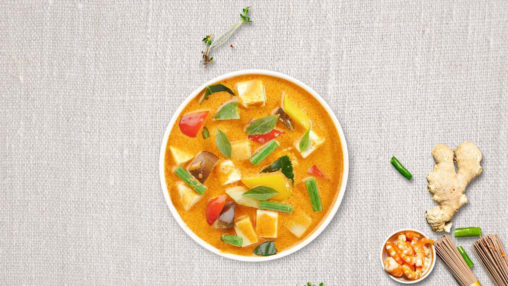Yellow Curry Tofu · Deep fried tofu in yellow curry with potatoes, onions, and carrots.