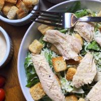 Caesar Chicken Salad · Fresh cut romaine lettuce, parmesan cheese, croutons, topped with grilled chicken and creamy...