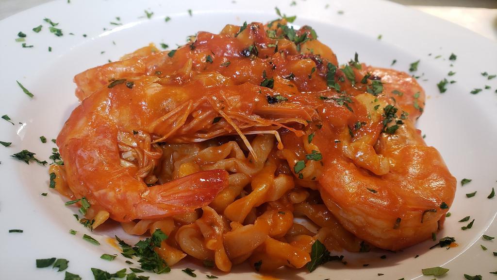 Penne IMPERIAL ( Prawns) · PRAWNS sauteed in white wine w/a touch of tomato