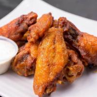 Hot Wings · Crispy wings tossed in buffalo sauce and served with Ranch