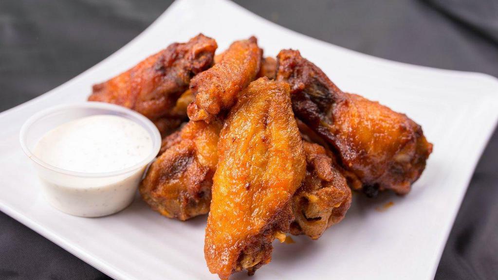 Hot Wings · Crispy wings tossed in buffalo sauce and served with Ranch