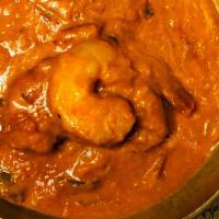 Prawn Curry · Prawn cooked with onion, ginger, garlic, turmeric and other Indian spices