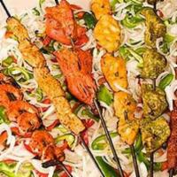 Tandoori Prawn · Char-grilled prawn flavored with Indian herbs and spices.