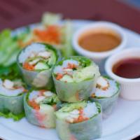 Fresh Summer Rolls (Vegetarian) · Tofu, rice noodles, cucumber, mint, cilantro, and carrot wrapped in rice paper and served wi...