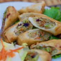 Vegetarian Spring Rolls · Mixed cabbage, carrots, cilantro, celery, and glass noodles wrapped in an egg roll, deep-fri...