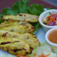 Satay · Chicken skewers marinated in coconut milk with a hint of yellow curry, barbequed to perfecti...