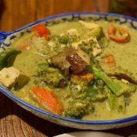 Green Curry · Choice of chicken, beef, pork, or prawns in homemade green curry prepared with green chili p...