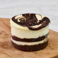 Chocolate Marble Cheesecake · Ribbons of bittersweet chocolate and espresso ganache swirled into our rich vanilla cheeseca...