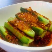 红油凉拌黄瓜Refreshing Cucumber Cubes with Chili Sauce · Cucumber with chili oil, garlic and sesame oil.