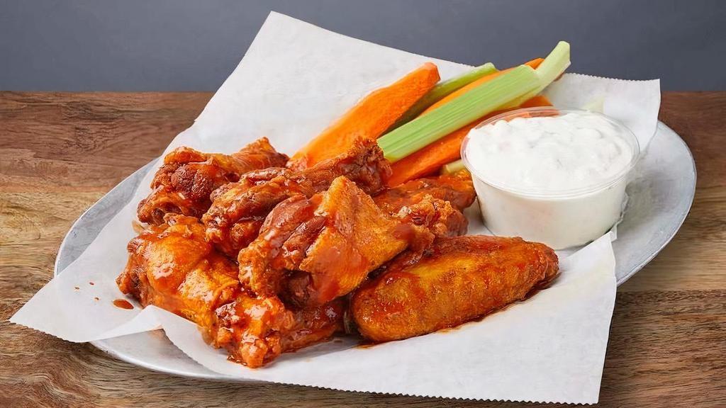 BUFFALO WINGS :: · Buffalo wings with Frank's Red Hot, served with carrots, celery, & blue cheese dressing