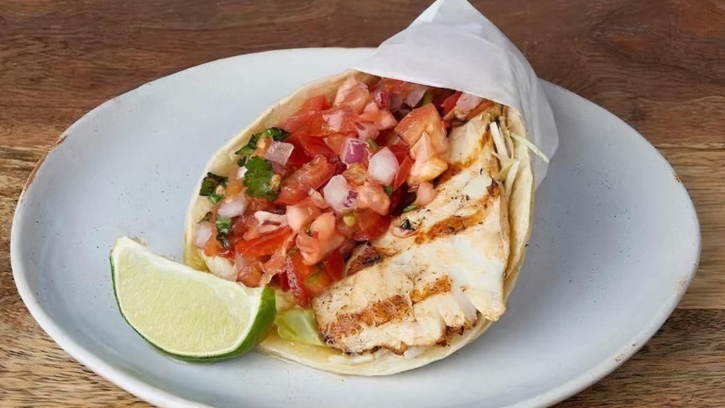 GRILLED FISH TACO :: · Marinated & grilled mahi-mahi in soft corn tortillas with cilantro, cabbage, red onions, pico de gallo, & tomatillo salsa