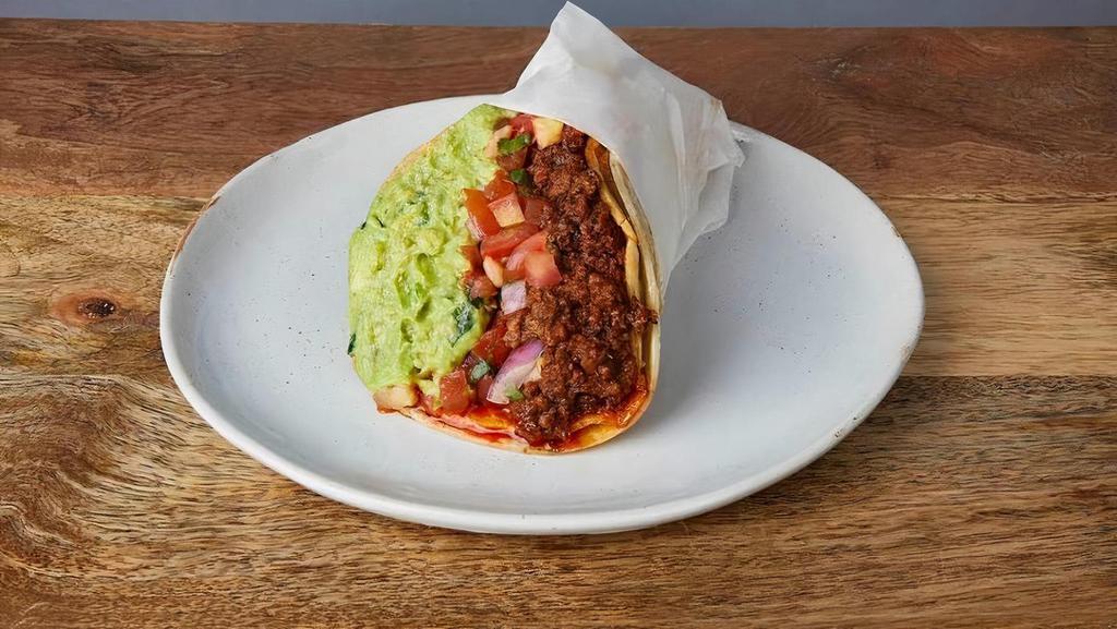 NICK'S WAY CHORIZO :: · One taco with a grilled crispy corn tortilla wrapped in a soft corn tortilla. With Jack cheese, pinto beans, pico de gallo, & guacamole