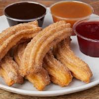 CHURROS :: · Classic Mexican churros with chocolate, caramel, or strawberry sauce