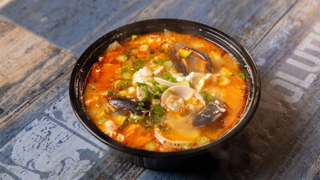 Spicy Tofu Soup · Seafood  and beef.
