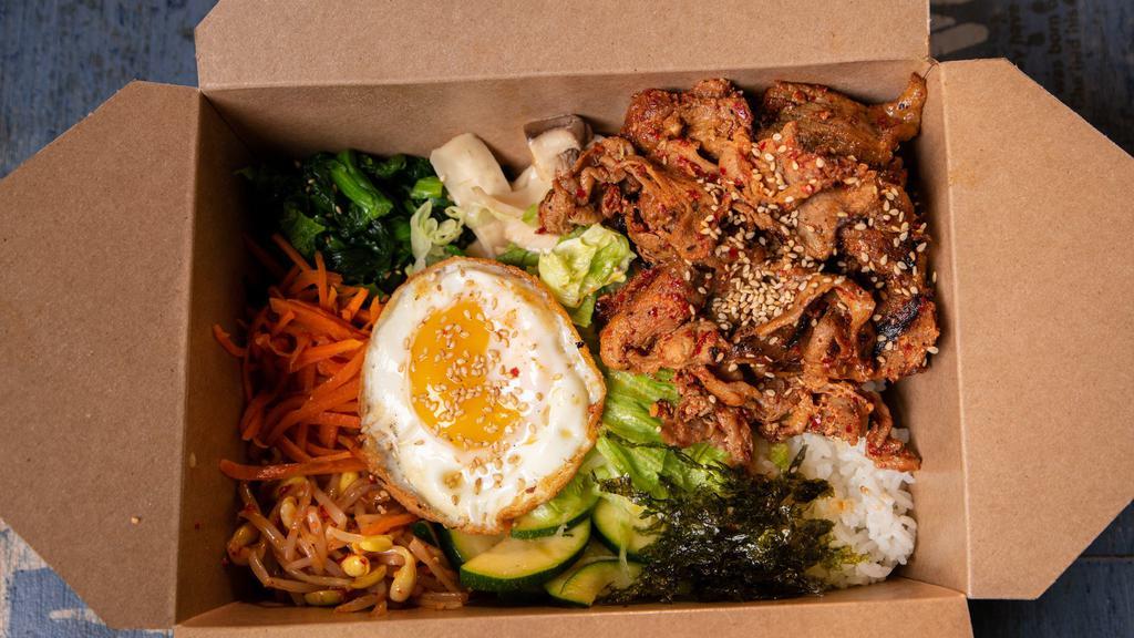 Spicy Pork Bibimbop - BBQ Gochujang Pork · Includes 
Choice of Rice, Meat, Variety of Seasonal Vegetables, Fried Egg and side of Spicy Gochujang sauce