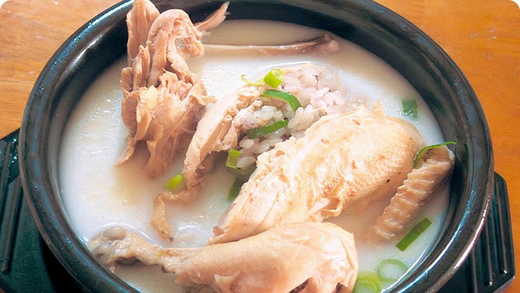 Ginseng Young Chicken Soup / 영계 삼계탕 · Whole young chicken stuffed with ginseng, jujubes, chestnuts, sticky rice and garlic.