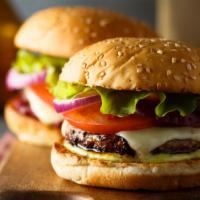 Lamb Burger · Lamb burger, cheese, onions, lettuce, tomatoes with garlic mayonnaise.