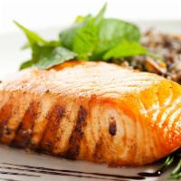 Roasted Salmon Fillet · Oven roasted 8 oz Salmon Fillet with herbs served with delicious oven roasted seasonal veggi...
