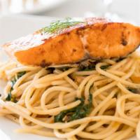 Oven Roasted Salmon With Spaghetti Pasta · Spaghetti pasta topped with capers sauce and oven roasted Salmon fillet.
Served with toasted...