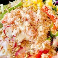 Creamy Crab Salad · crab salad, cabbage mix, red radish, cucumber, bell pepper, corn, sesame	seeds, creamy sesam...