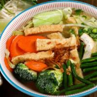 Pho Buddha · Gluten-free. Vegan broth from apples, carrots, kohlrabi, and cabbage. Topped with tofu and v...
