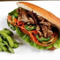 BBQ Pork Sandwich · All-natural grilled pork. Served on an airy French baguette stuffed with home-made aioli, cu...