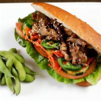 Ribeye Sandwich · USDA black Angus steak. Served on an airy French baguette stuffed with home-made aioli, cucu...