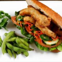Crispy Basa Sandwich · Crispy white basa fish. Served on an airy French baguette stuffed with home-made aioli, cucu...