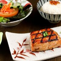Salmon Rice Plate. · Grilled salmon with Jasmine rice and green salad.