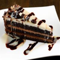 Tripple Chocolate Cake · Chocolate cake layered with milk, dark and ivory mousses.