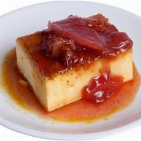 Flan · Coconut flan topped with seasonal compote