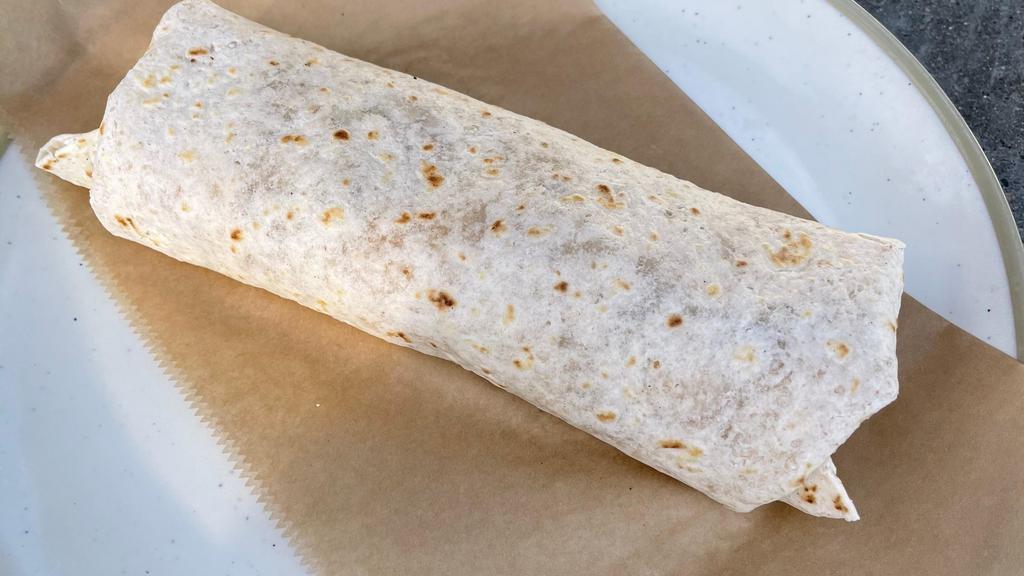 Kids Burrito · Flour tortilla filled with pinto beans, rice & white cheese. Add chicken for $2!