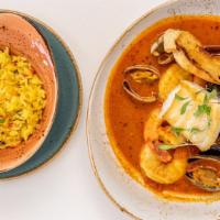 Paella Del Toro · Deconstructed Paella served with shrimp, halibut, clams, mussels, bay scallops, pancetta, to...