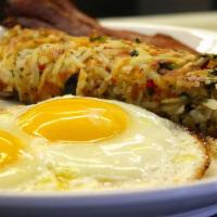 Combo Breakfast · 2 pancakes or French toast, scrambled eggs, and choice of smoked bacon, turkey bacon, or smo...