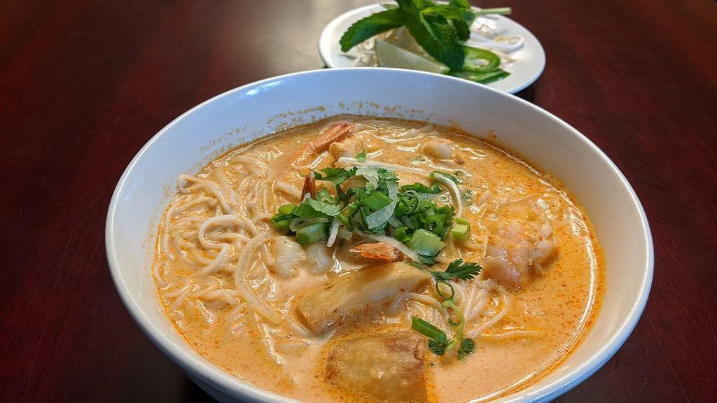 B13. Vermicelli with Vietnamese Yellow Curry · Choice of shrimp or chicken.  Curry is one level of spicy, cannot be adjusted.