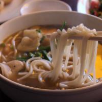 B12. Bac Lieu Noodle Soup · Bún mắm.  Fish broth noodle soup served with shrimp, fish, calamari, pork, and side of fre...