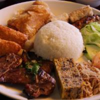 D1. Special 7 Combo Rice Platter · Pork chop, shrimp paste in tofu skin, grilled shrimp sugarcane skewers, chicken skewer, frie...