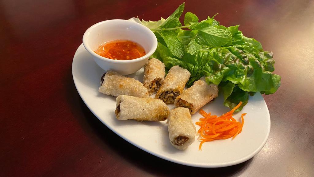 A1. Fried Egg Rolls · (Imperial rolls) Filled with pork, silver noodle, taro, carrot, etc.  Served with house dipping fish sauce.