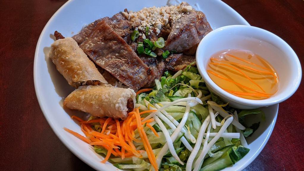B4. Vermicelli with Grilled Pork & Fried Egg Rolls · Contains peanuts.  Request for no peanuts at time of order. 
Served with side of house fish sauce.