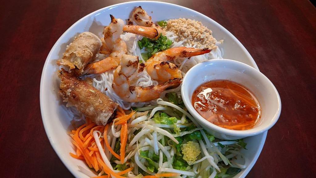 B8. Vermicelli with Grilled Shrimps & Fried Egg Rolls · Contains peanuts.  Request for no peanuts at time of order. 
Served with side of house fish sauce.