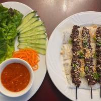 C5. Woven Rice Noodle Sheet & Beef Skewers · Contains peanuts.  Request for no peanuts at time of order. 
Served with side of house fish ...